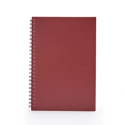 Caderno A5 com capa vermelha