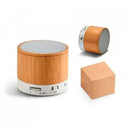Caixa de som com microfone e transmissão via bluetooth, revestida em bambu
