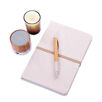 Kit com caderno, caixa de som, vela e caneta - 1685539