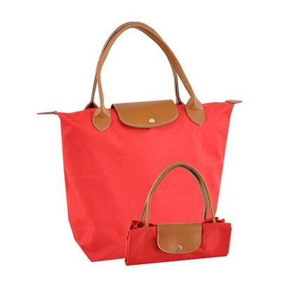 Bolsa feminina vermelha com alças em sintético e aba com botão de pressão - 1281141