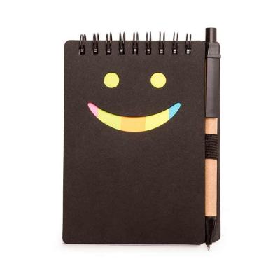 Bloco de anotações ecológico com caneta de papelão. Possui detalhe “smile“ na capa frontal(verso ...