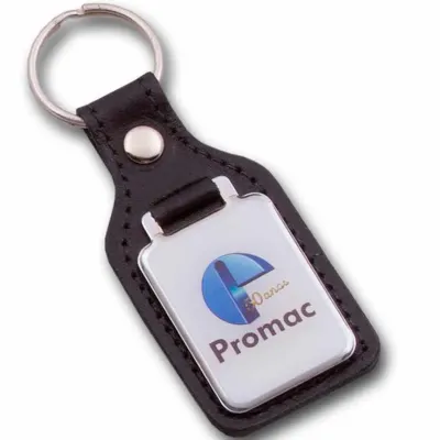 Chaveiro em couro e metal. Personalizado em baixo relevo com sua logomarca.